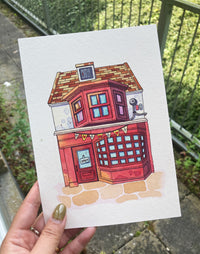 Hand-Painted Red Shop with Bunting Illustration