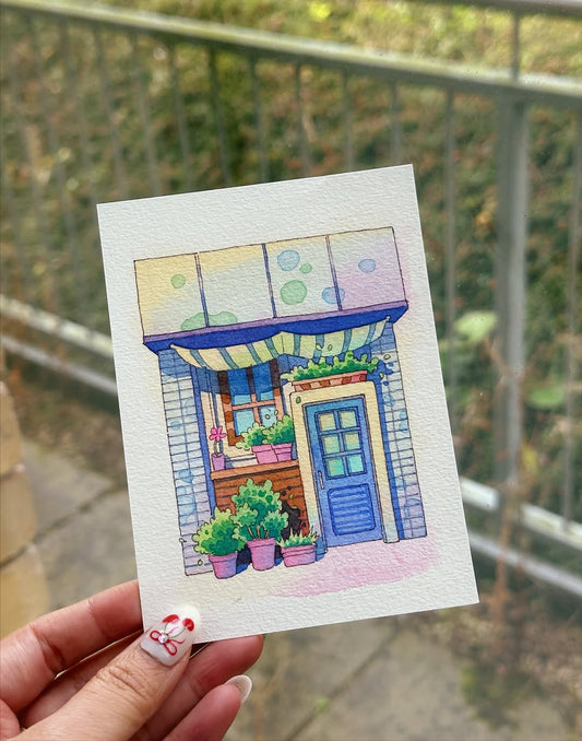 Where the Plants Wait by the Door - Watercolor Storefront Illustration