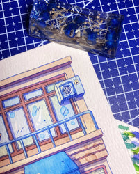 Blue Shade, Red Welcome - Watercolor Storefront Illustration